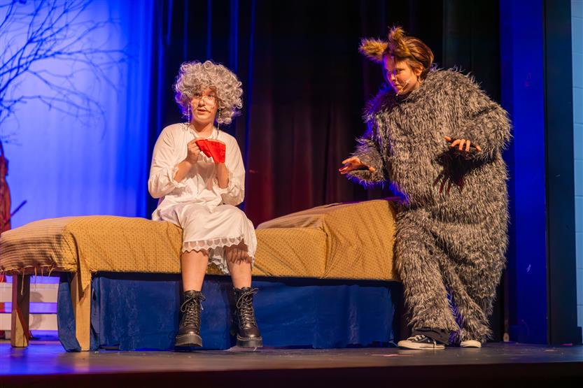 Students perform onstage